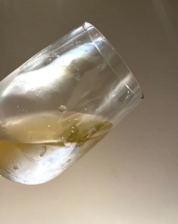 A glass of Chardonnay at a wine tasting
