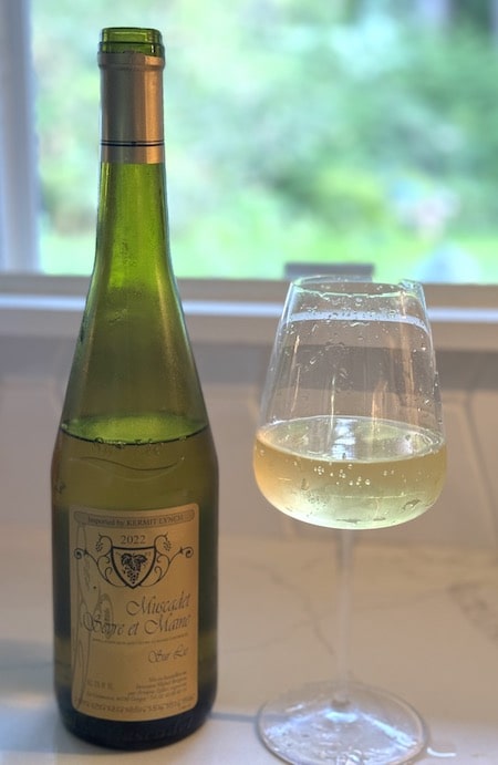 Muscadet is a great value bone dry white wine from France made with the Melon de Bourgogne grape that can have more texture when it says Sur Lie